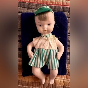 Vintage unglazed bisque porcelain boy doll. Made and purchased in Japan 1950’s.